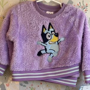 NWT 12 Month Size Super Plush Purple Fuzzy Bluey Pullover w/ Criss Cross Band